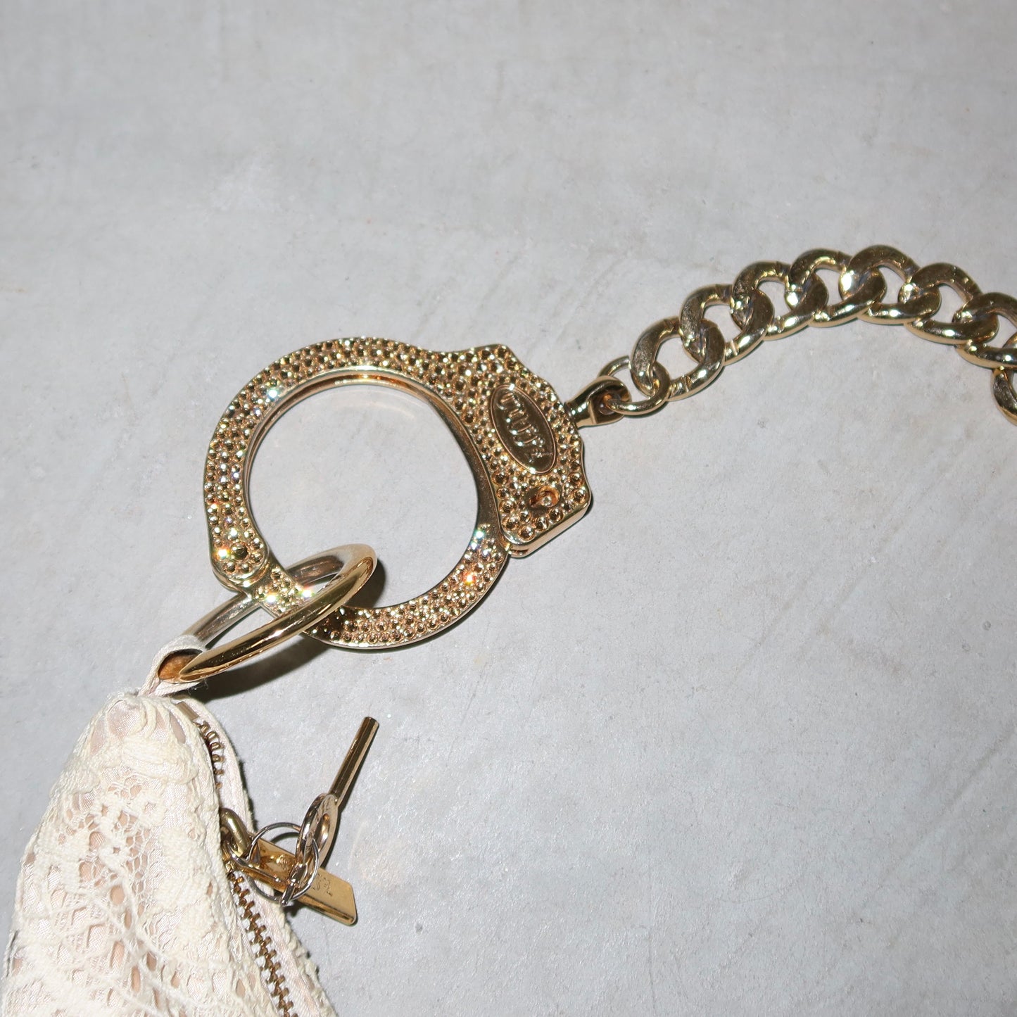 Cuffz Rare Lace Barfly Bag with Gold Swarovski Cuff