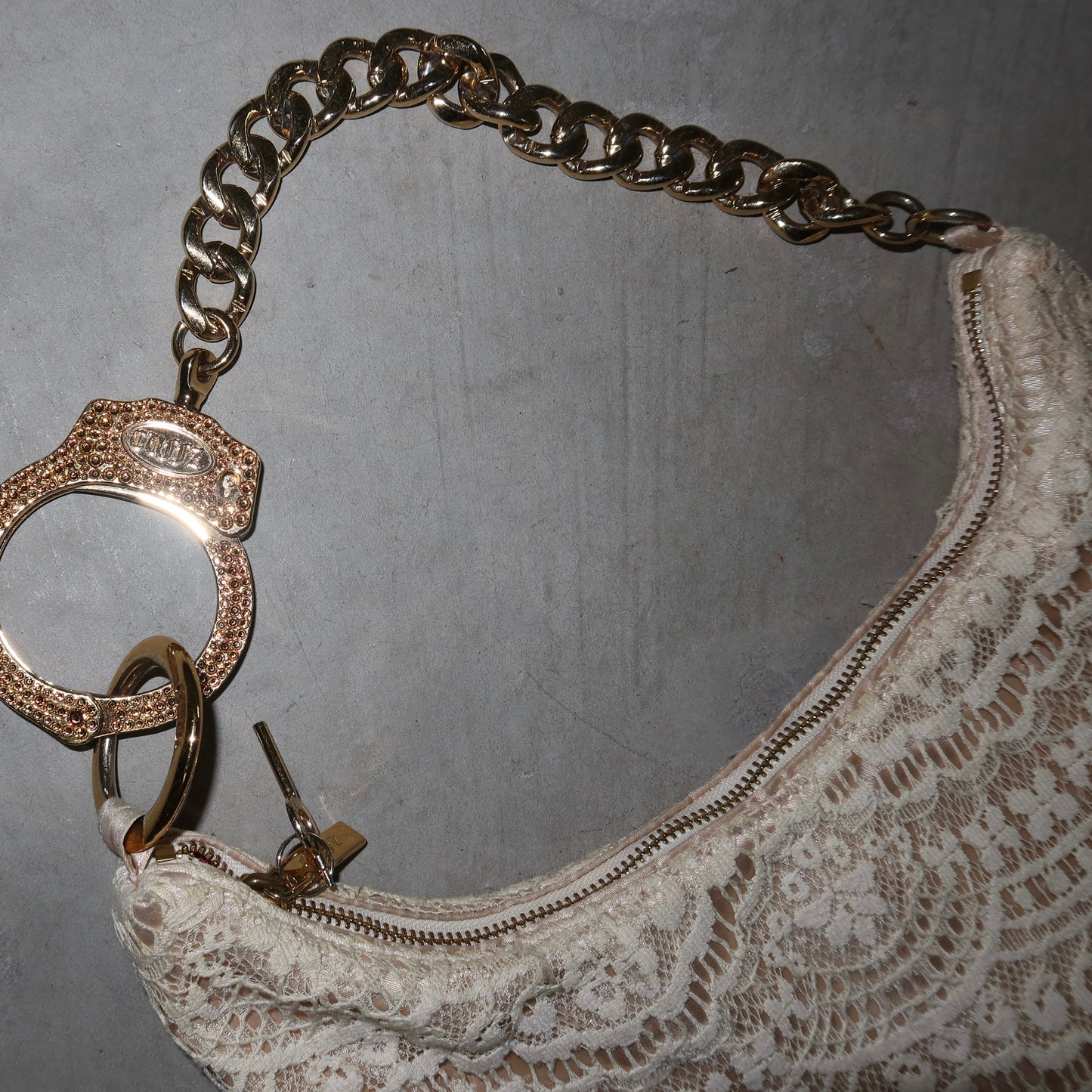 Cuffz Rare Lace Barfly Bag with Gold Swarovski Cuff