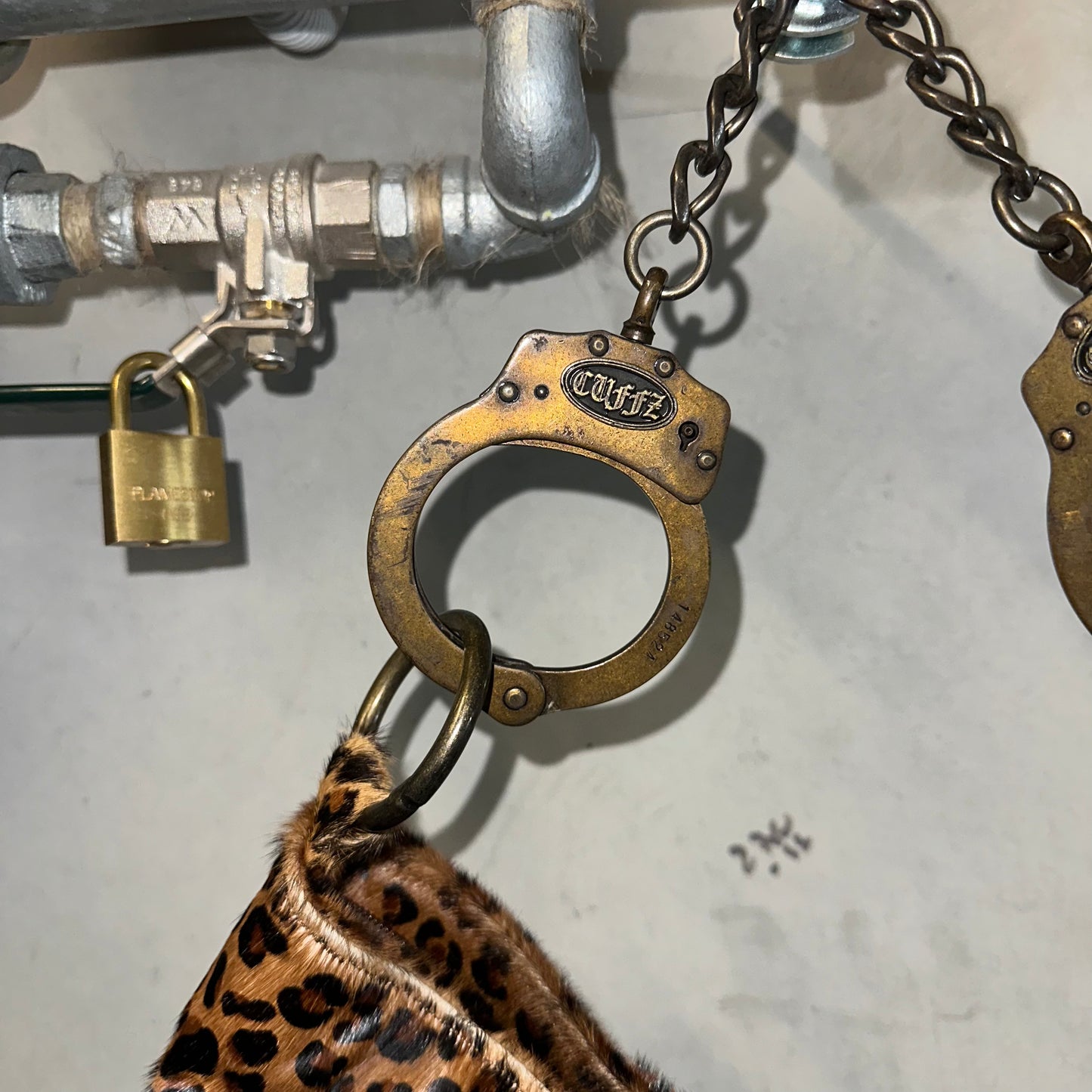Cuffz Rare Leopard Print Pony Hair Double Cuff Bag