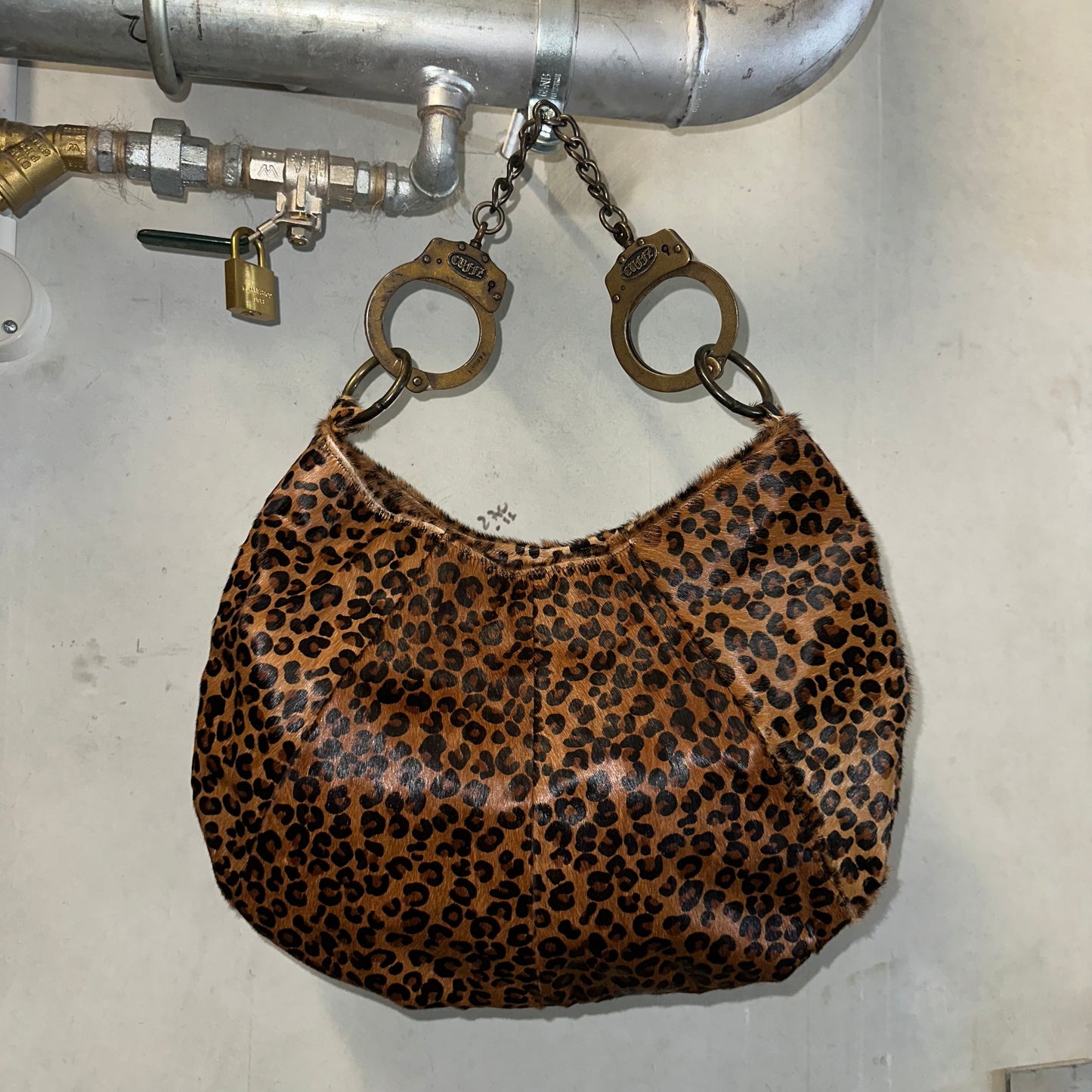 Cuffz Rare Leopard Print Pony Hair Double Cuff Bag